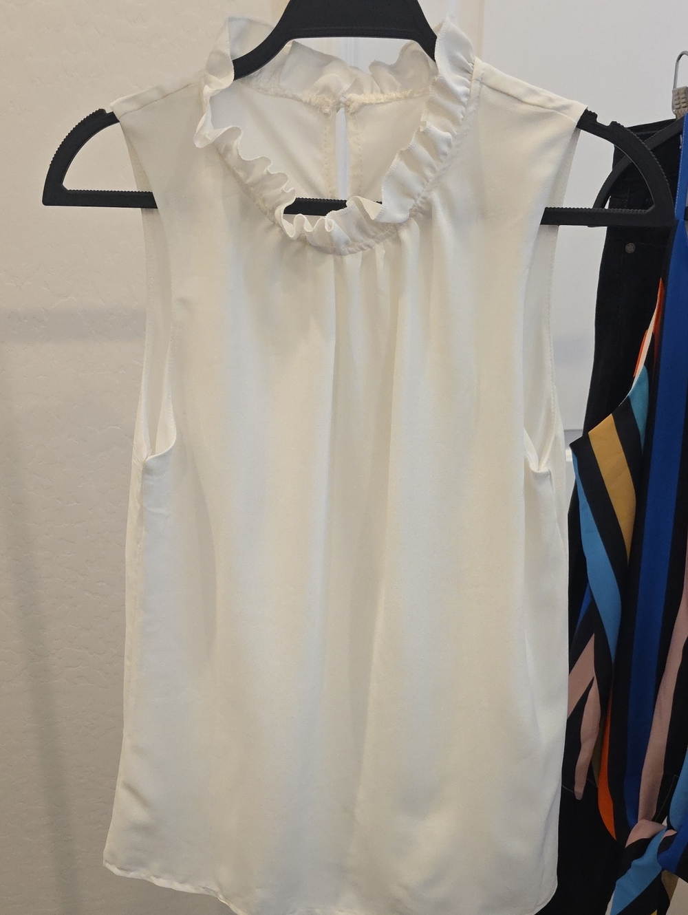 Ivory Ruffle Neck Sleeveless Blouse